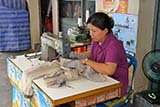 Roadside clothes repairs and alterations in Hat Yai - Click for larger image