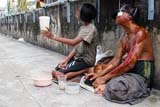 Begging on the streets of Thailand - Click for larger image