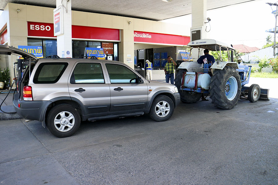 Waiting behind a tractor to fill my car up with fuel