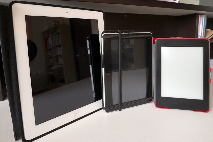 The Thai tablet compared to an iPad and a Kindle Paperwhite
