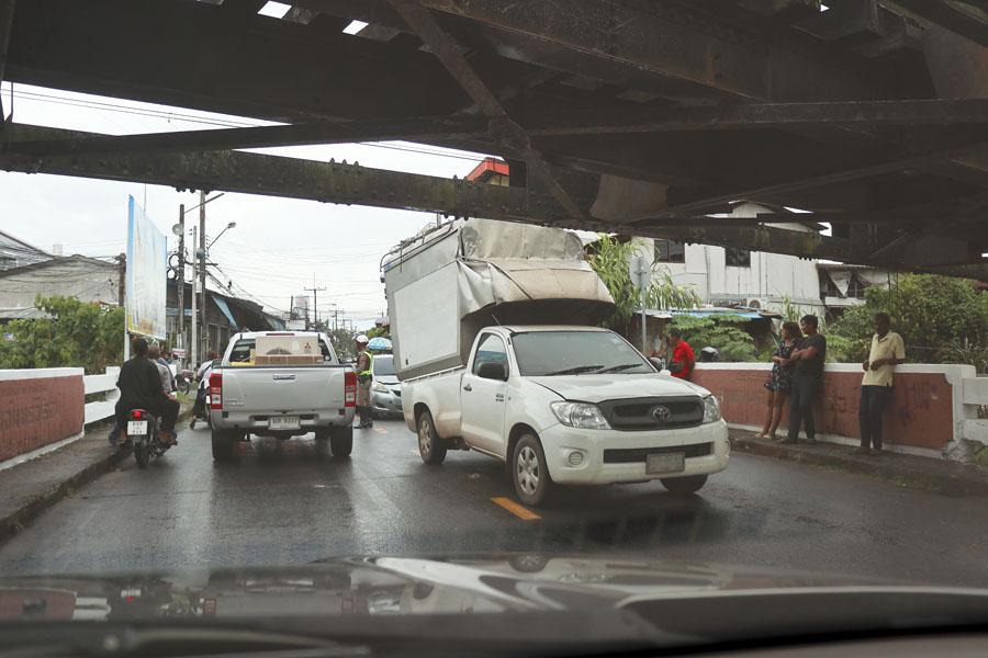 Pickup truck meets railway bridge