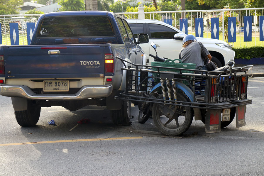 Collision outside the school in NST - an extremely common sight in Thailand