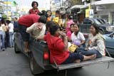 Classy Thai woman in the back of a pickup truck - Click for larger image