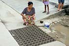 Fishing in a storm drain, Mae Sot - Click for larger image