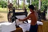 Making rubber mats, Thailand - Click for larger image