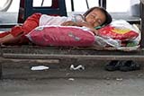 Sleeping under the railway bridge - Click for larger image