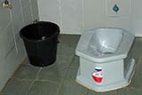 Squat toilet in Thailand - Click for larger image