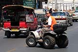 Quad bike on the road in Thailand - Click for larger image