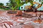 A bulldozer rips up the land in Phattalung province - Click for larger image