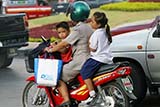 Young Thai kids on a motorbike - Click for larger image